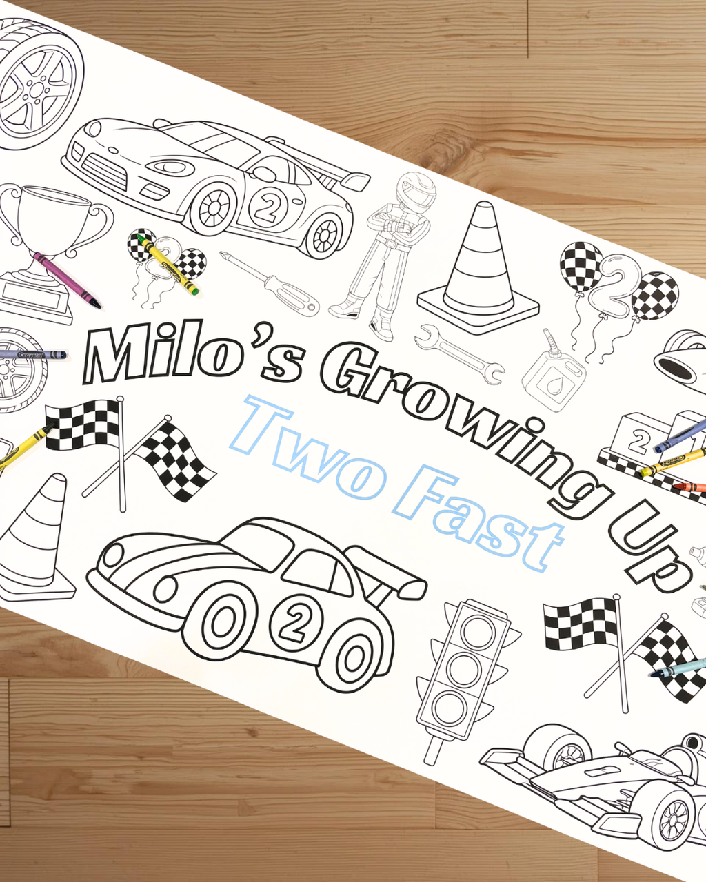 Coloring book page with racing theme and text 'Milo's Growing Up Two Fast' on a wooden surface.
